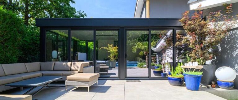 extension metzger toiture plate ouverture centrale triple vitrage volet roulant arlon